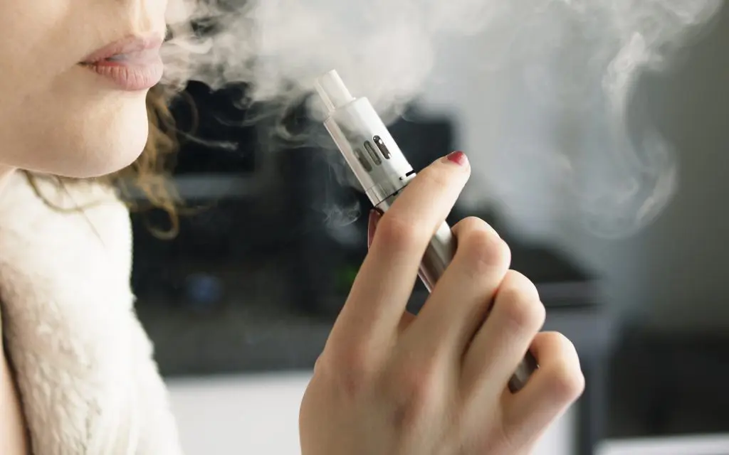 Woman Smoking an E Cigarette